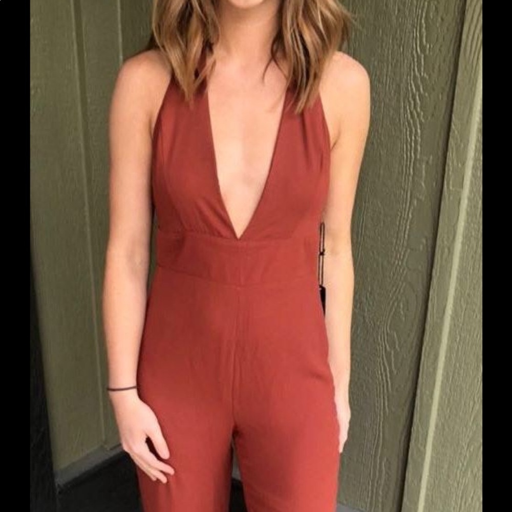 Rust Colored Halter Wide Legged Backless Jumpsuit